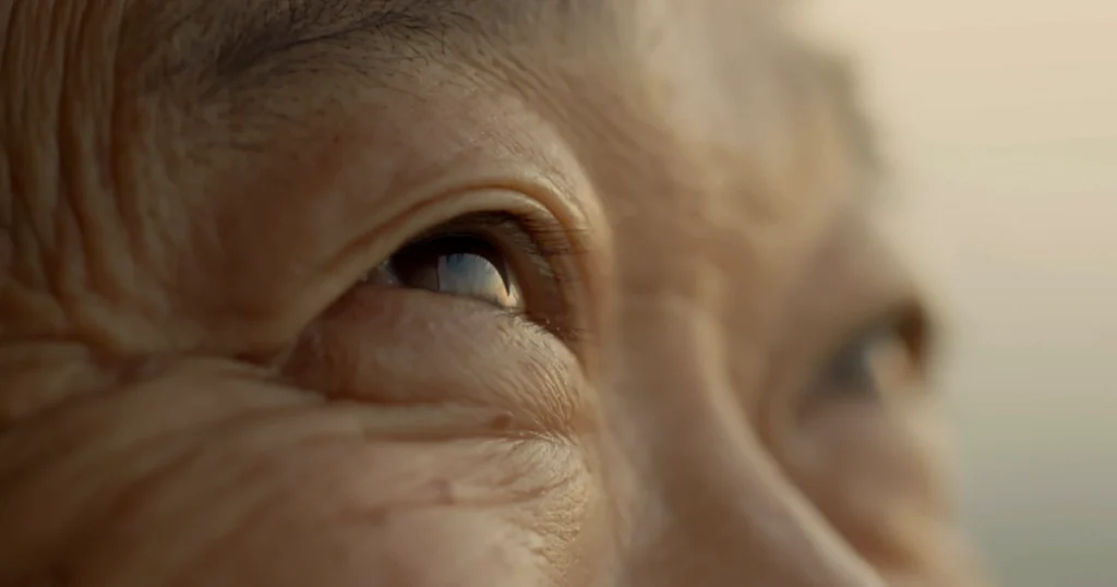 Close-up of an older adult’s eyes showing age-related vision changes linked to macular degeneration.