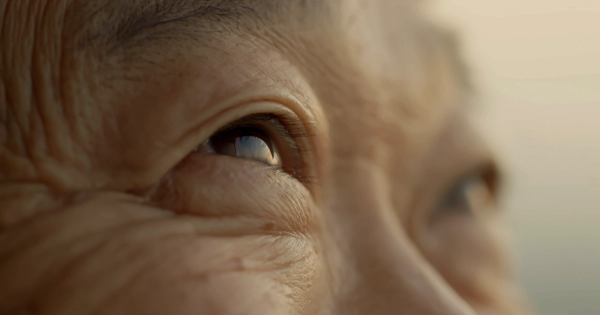 Close-up of an older adult’s eyes showing age-related vision changes linked to macular degeneration.